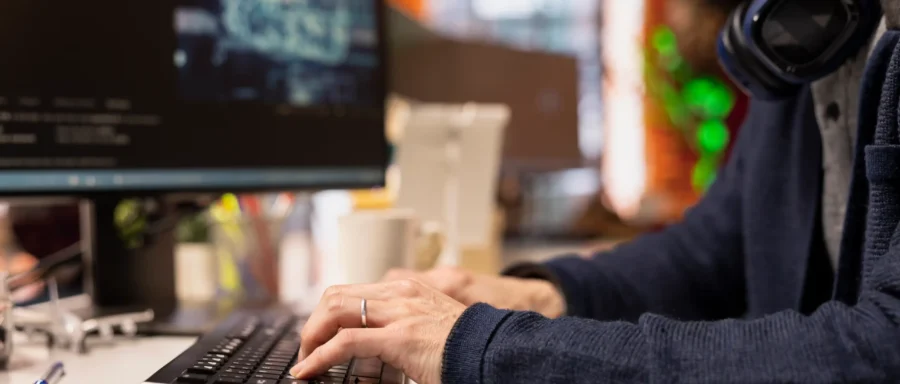 close-up-it-employee-doing-code-testing-quality-assurance close-up-it-employee-doing-code-testing-quality-assurance
