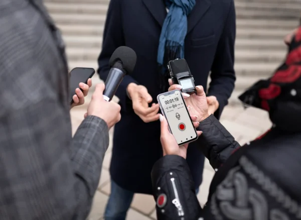 close-up-reporter-taking-interview