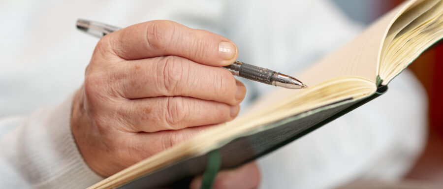 close-up-senior-woman-taking-notes close-up-senior-woman-taking-notes